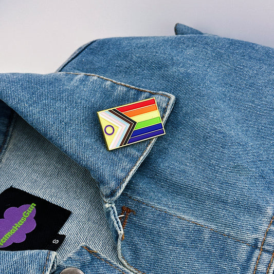 New Progressive Flag Enamel Pin on a jacket