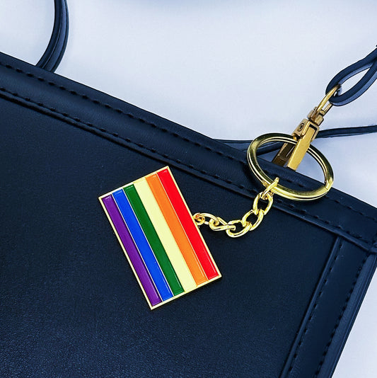 A rainbow pattern of Pride Flag Key Chain hung on the bag